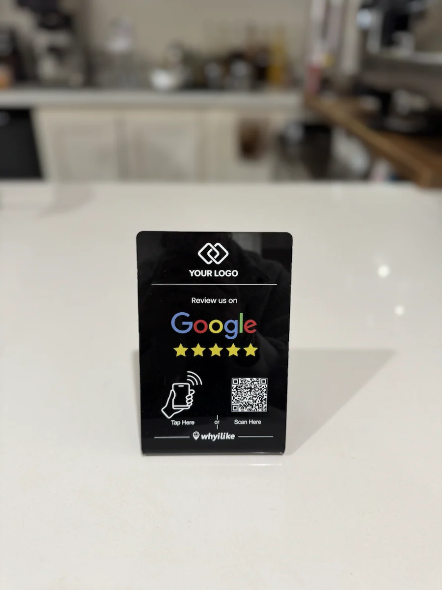 Real black WhyILike Google Review Stand with a sample custom logo