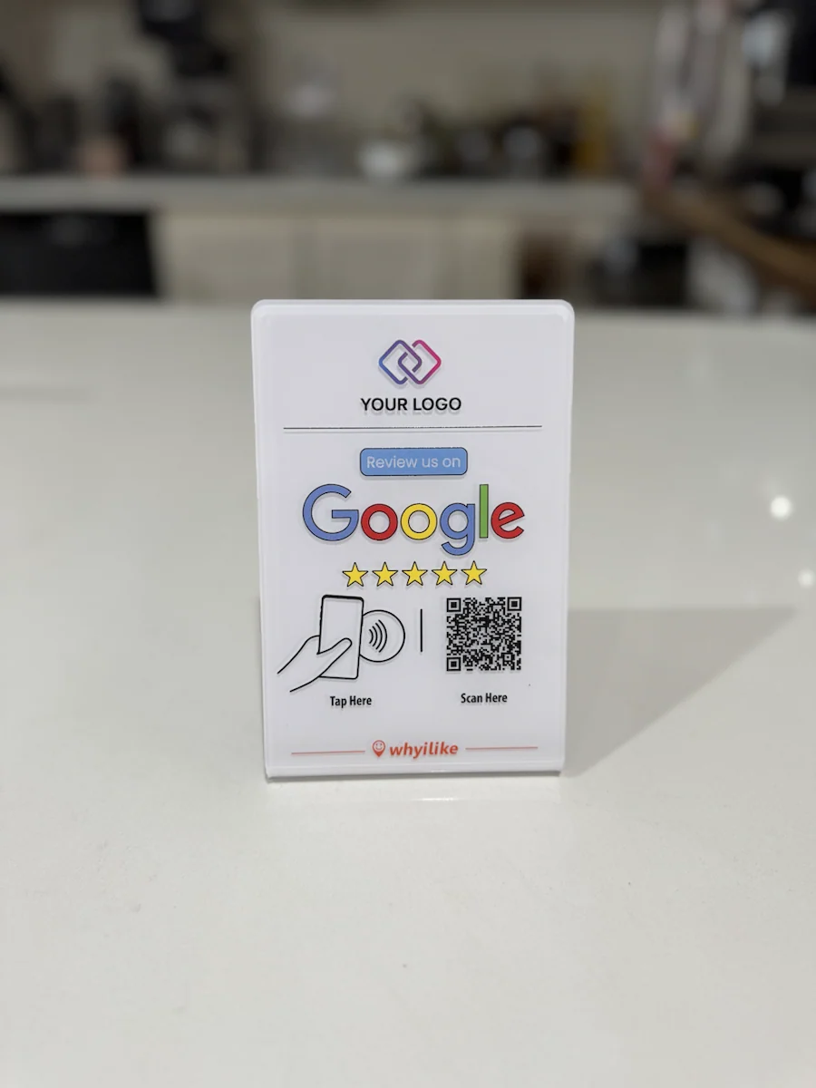 Real white WhyILike Google Review Stand with a sample custom logo